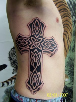 Celtic Cross Rib Tattoo